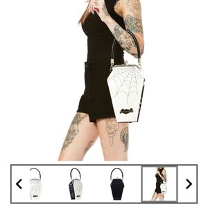 Sourpuss coffin purse